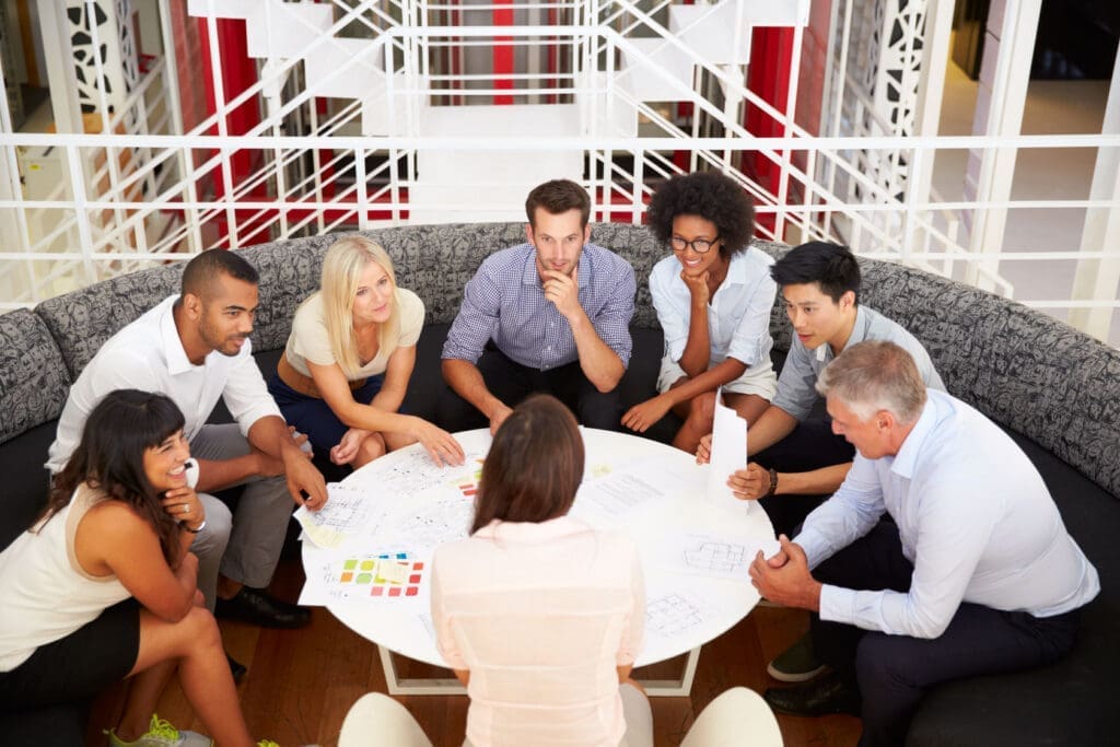 A group of people in a meeting.