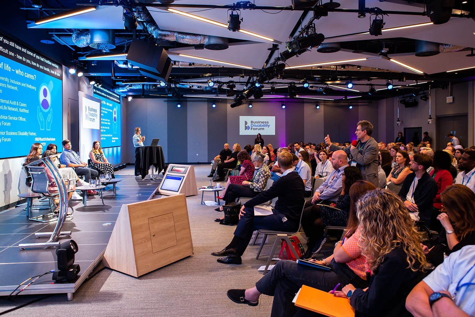 Member of the audience asking a question to the panel at the NatWest BDF conference