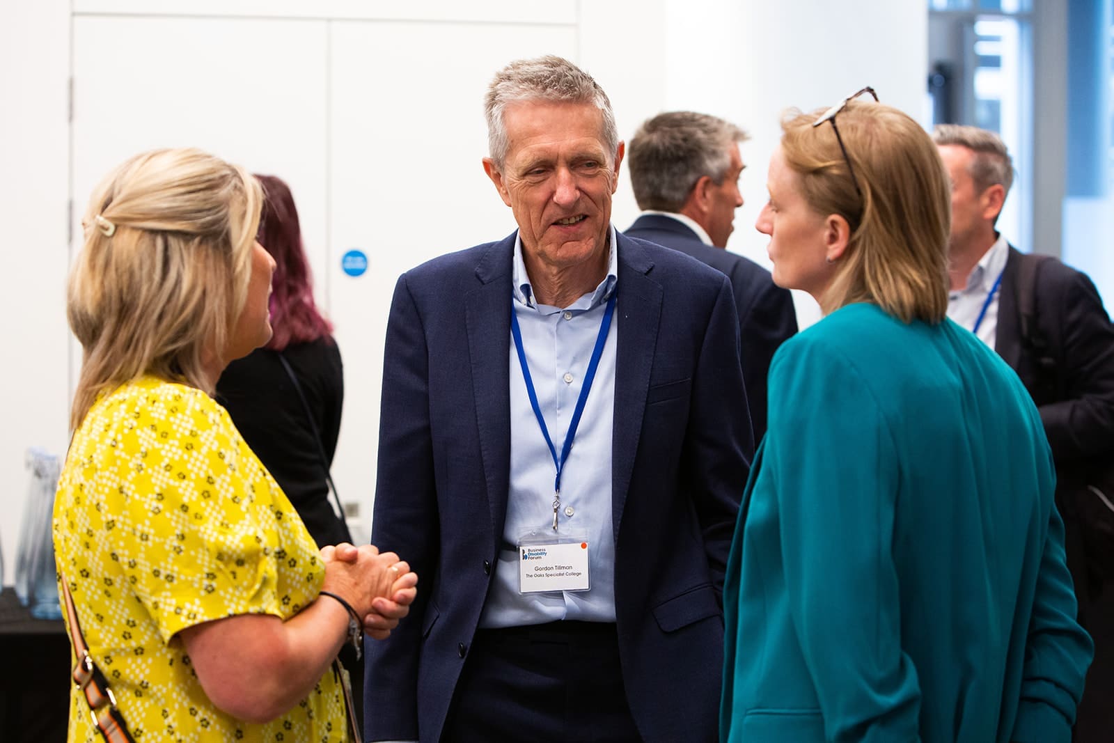 NatWest – Business Disability Forum Conference Three guests network at an event.