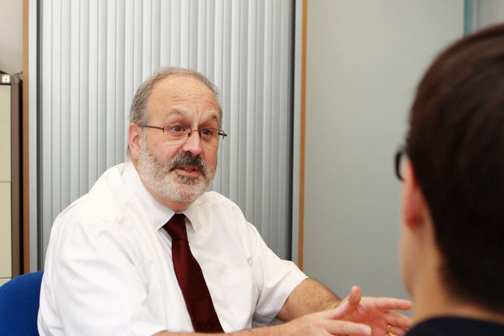A man in a business meeting.
