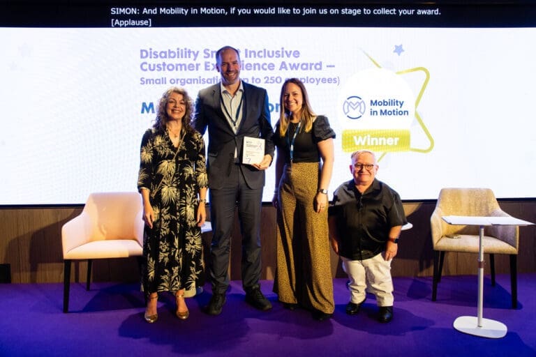 The Mobility in Motion team receiving the Inclusive Customer Experience Award from from ceremony hosts Diane Lightfoot and Simon Minty.