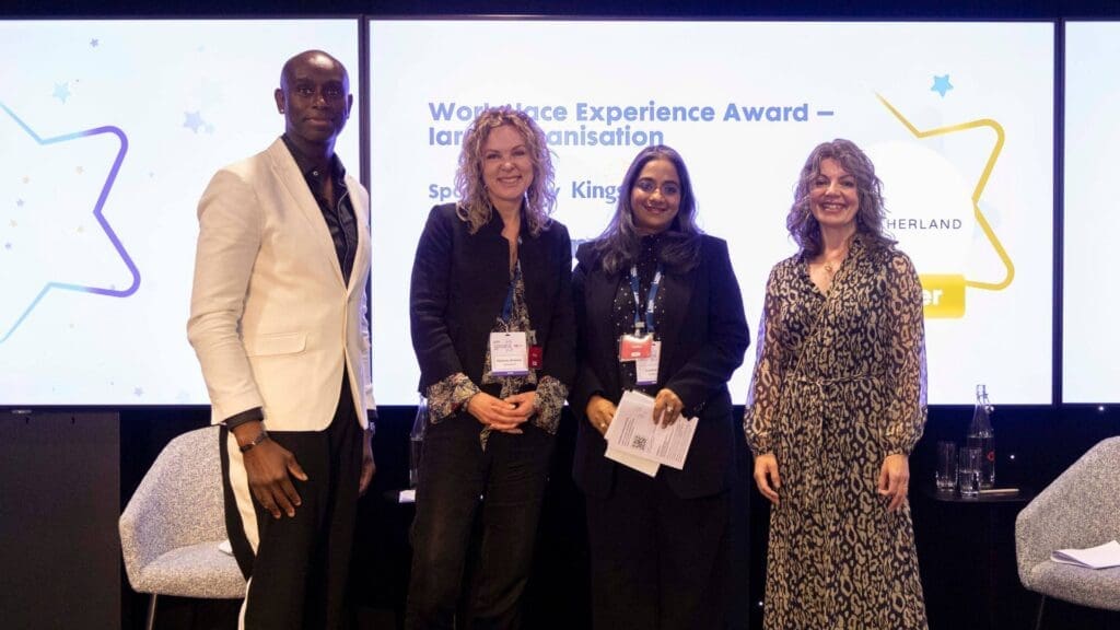 Sutherland team receiving Workplace Experience Award for large organisation on stage at the Disability Smart Impact Awards 2026.